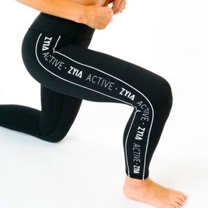 Zyia Active Black Leggings with zyia Active down the sides in white, size 4